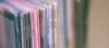 blurry close up of record spines