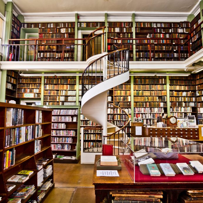 Library shelves with spiral staircase