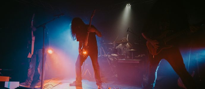 A heavy metal guitarist on stage
