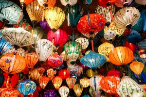 Colourful lanterns hanging from a ceiling